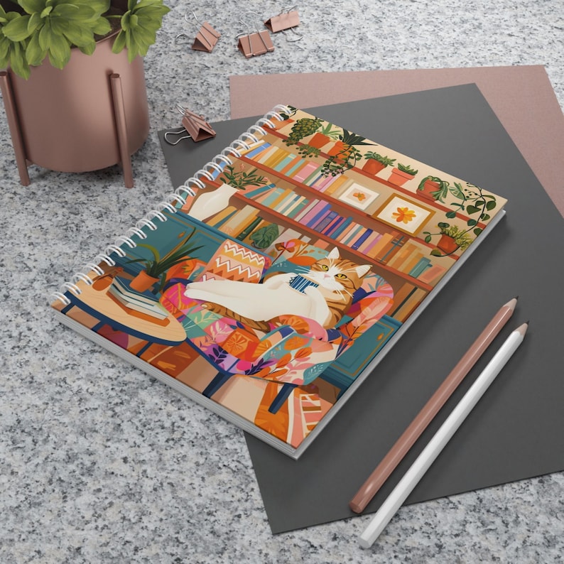 Cahier à spirale chat orange confortable avec coin lecture, 128 pages lignées, 90g